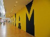 Kay Rosen created an l20-foot long wall mural titled “Manana Man.”