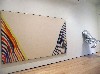An unfurled by Morris Louis among many of the artists works acquired by Kenworth Moffet and a poured sculpture by Linda Benglis.