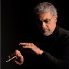 Placido Domingo conducts.